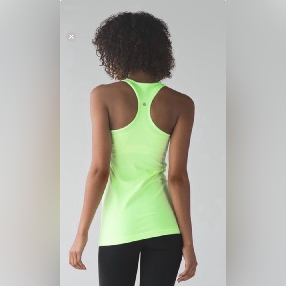 Lululemon cool racer back long fit tank top
Size 2 GUC neon yellow green